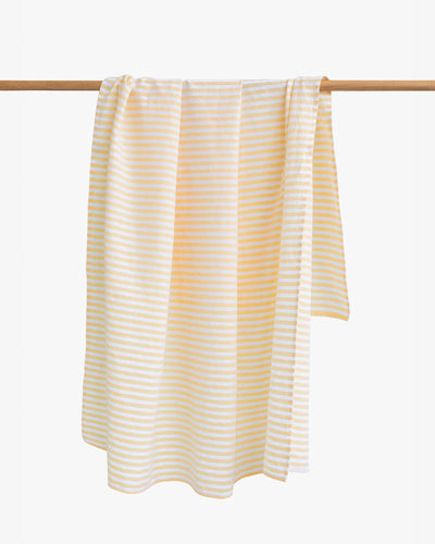 Linen beach towel in Striped yellow - MagicLinen