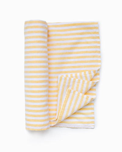Linen beach towel in Striped yellow - MagicLinen