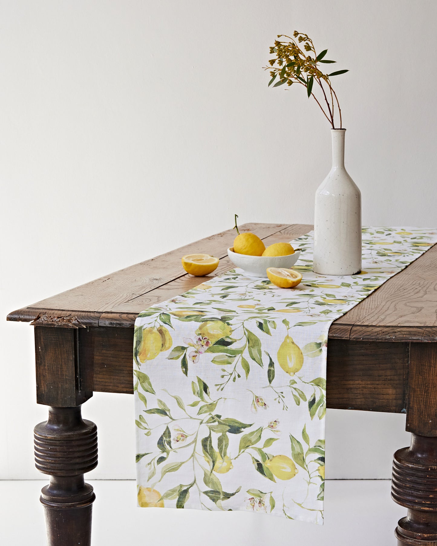 Linen Table Runner in Citrus garden print on white | MagicLinen