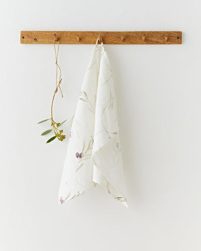 Linen tea towel in Olive orchard print on white | MagicLinen