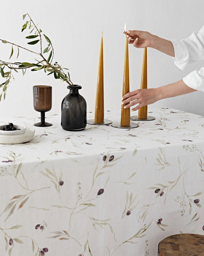 Olive orchard print on white linen tablecloth | MagicLinen