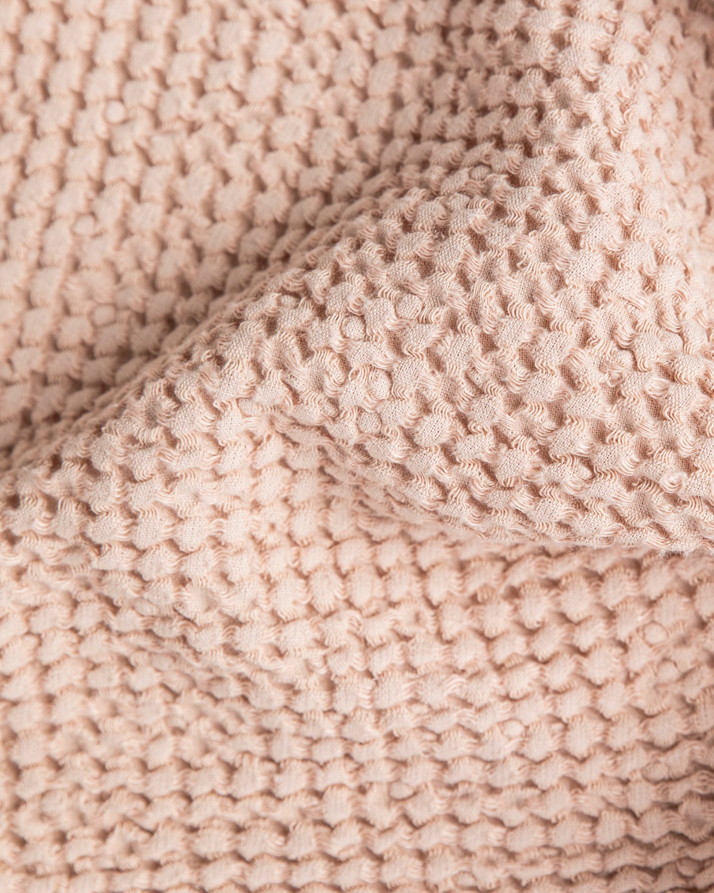 Waffle throw pillow cover in Woodrose - MagicLinen