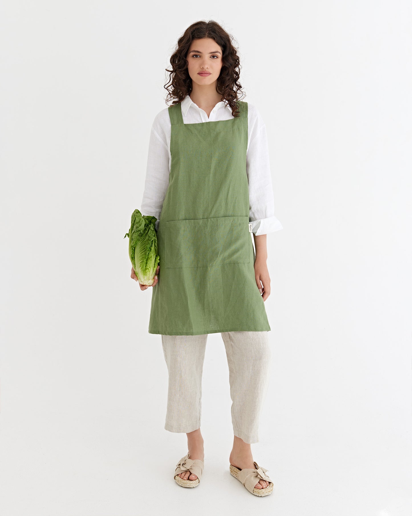 Pinafore cross-back linen apron in Forest green | MagicLinen