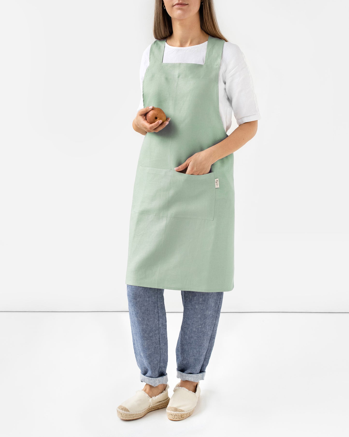 Pinafore cross-back linen apron in Sage green | MagicLinen