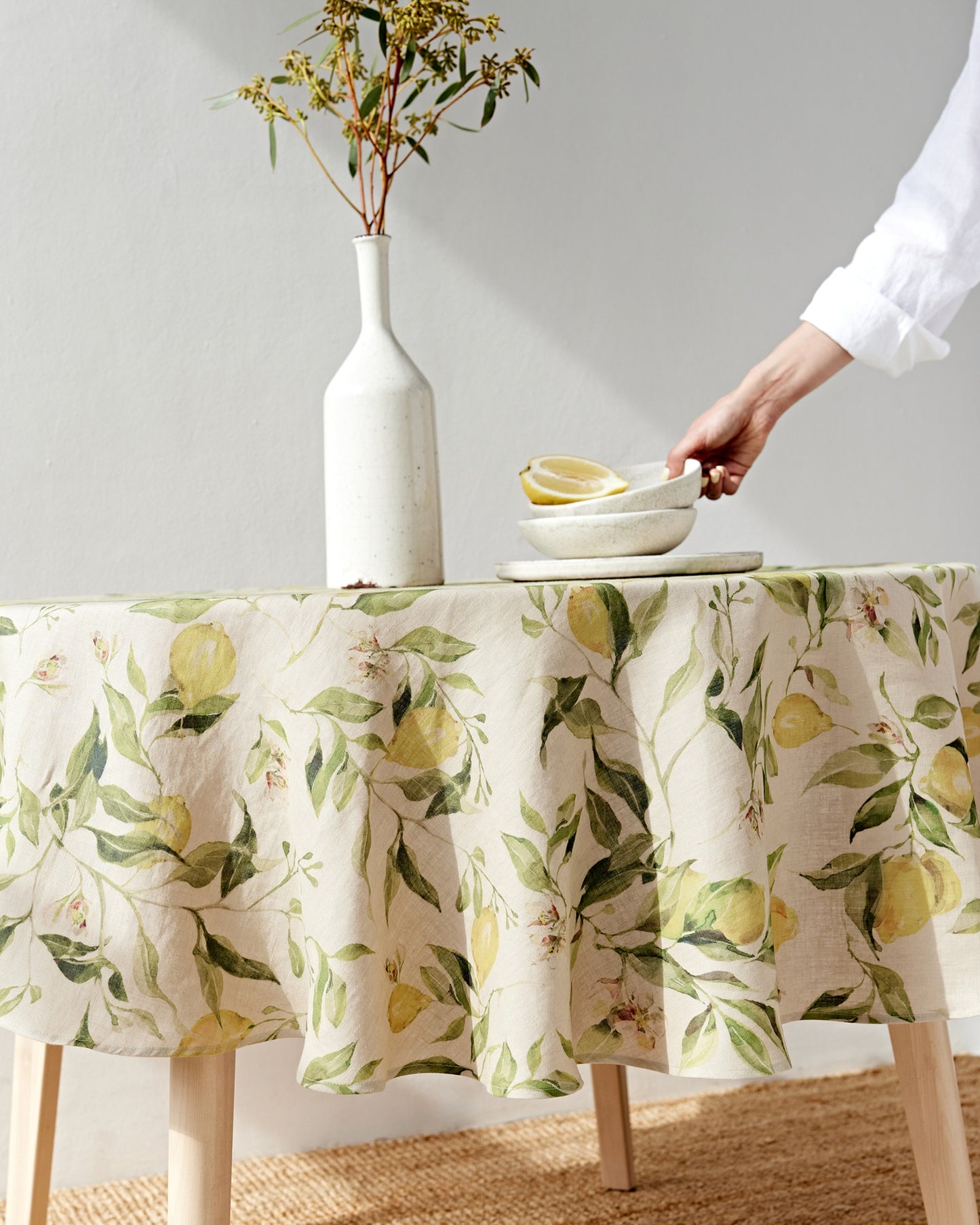 Round linen tablecloth in Citrus garden print on natural | MagicLinen