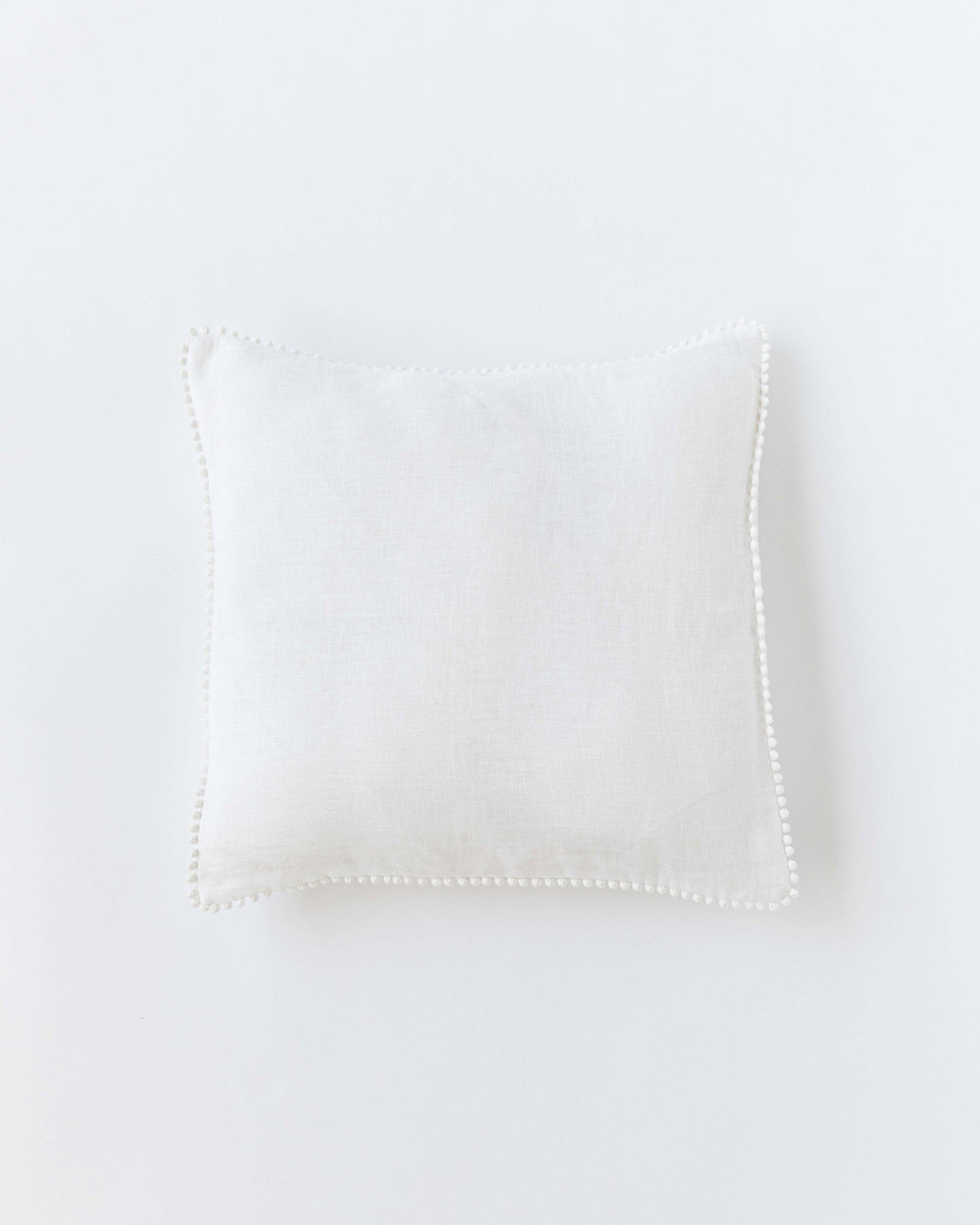 Pom pom trim linen pillowcase in White - MagicLinen