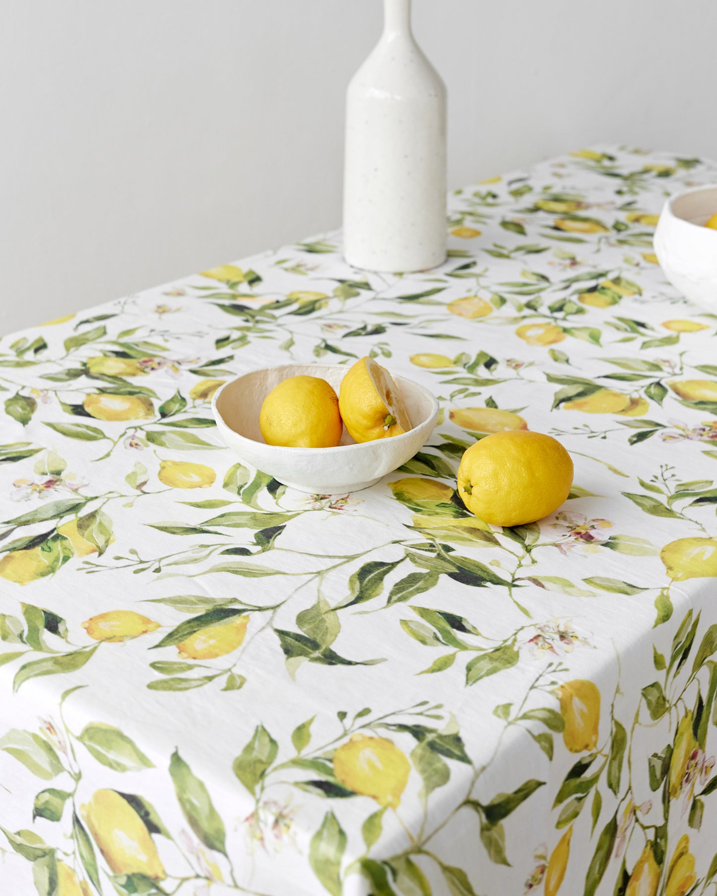 Citrus garden print on white linen tablecloth | MagicLinen