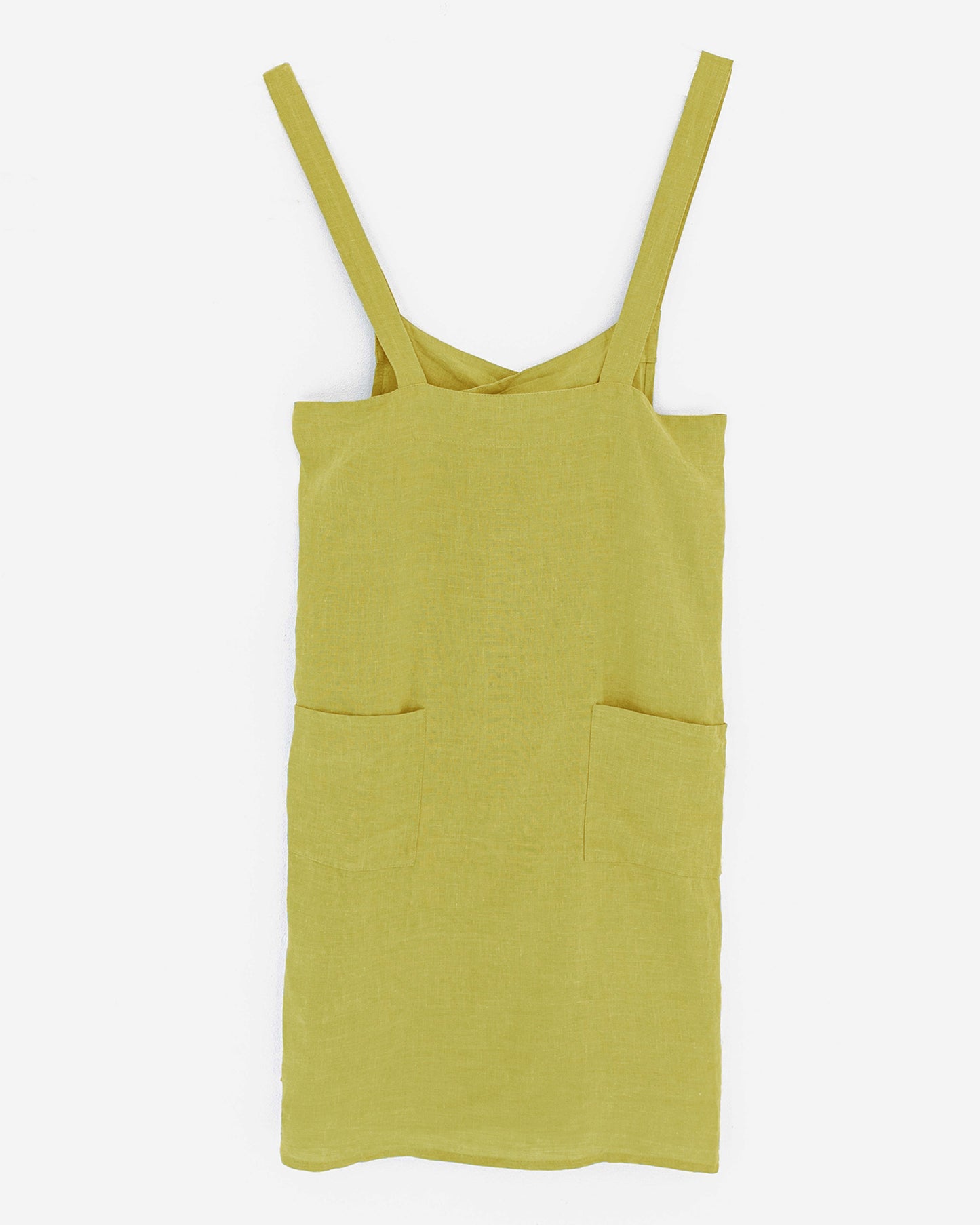 Japanese cross-back linen apron in Moss yellow