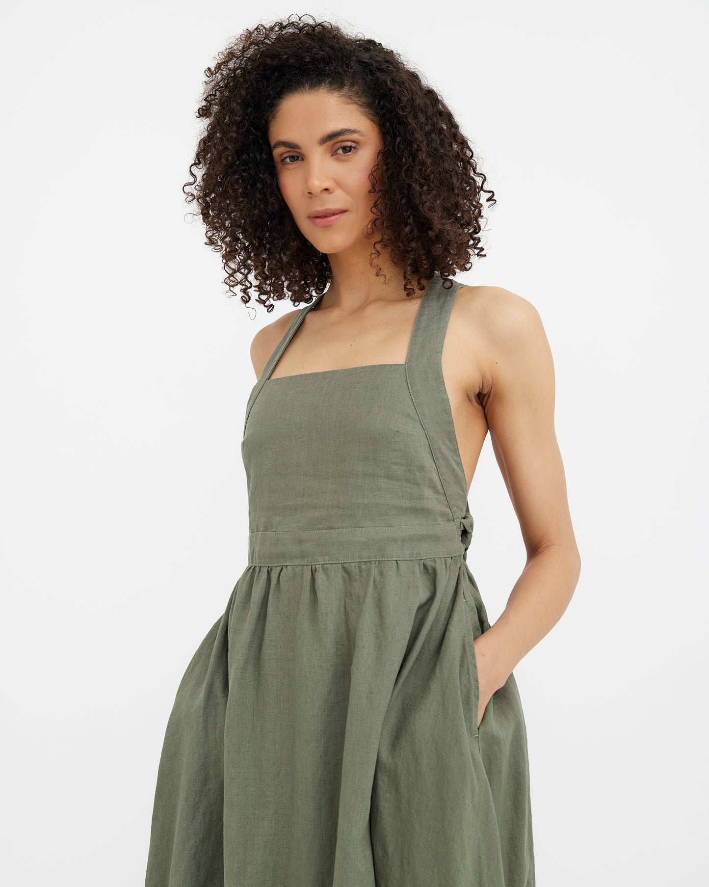 MagicLinen Mist green Linen Apron Dress MIRISSA with square neckline and cross-back straps  