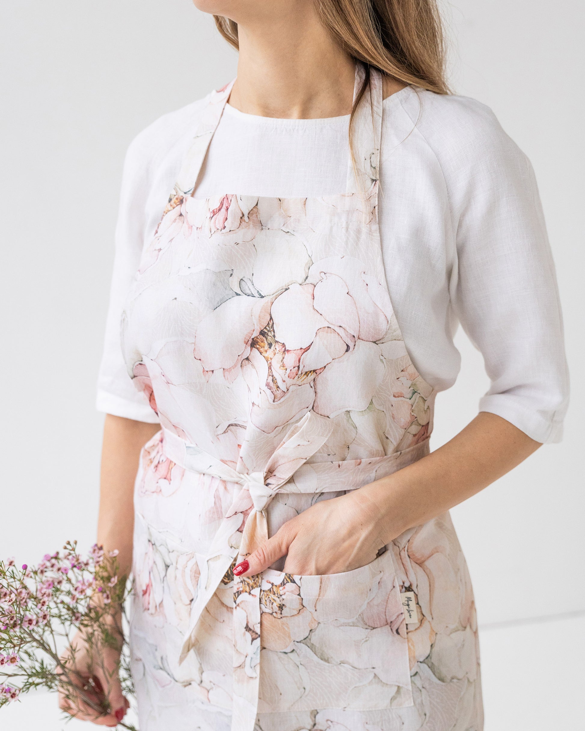 Linen bib apron in Pastel peonies Print | MagicLinen