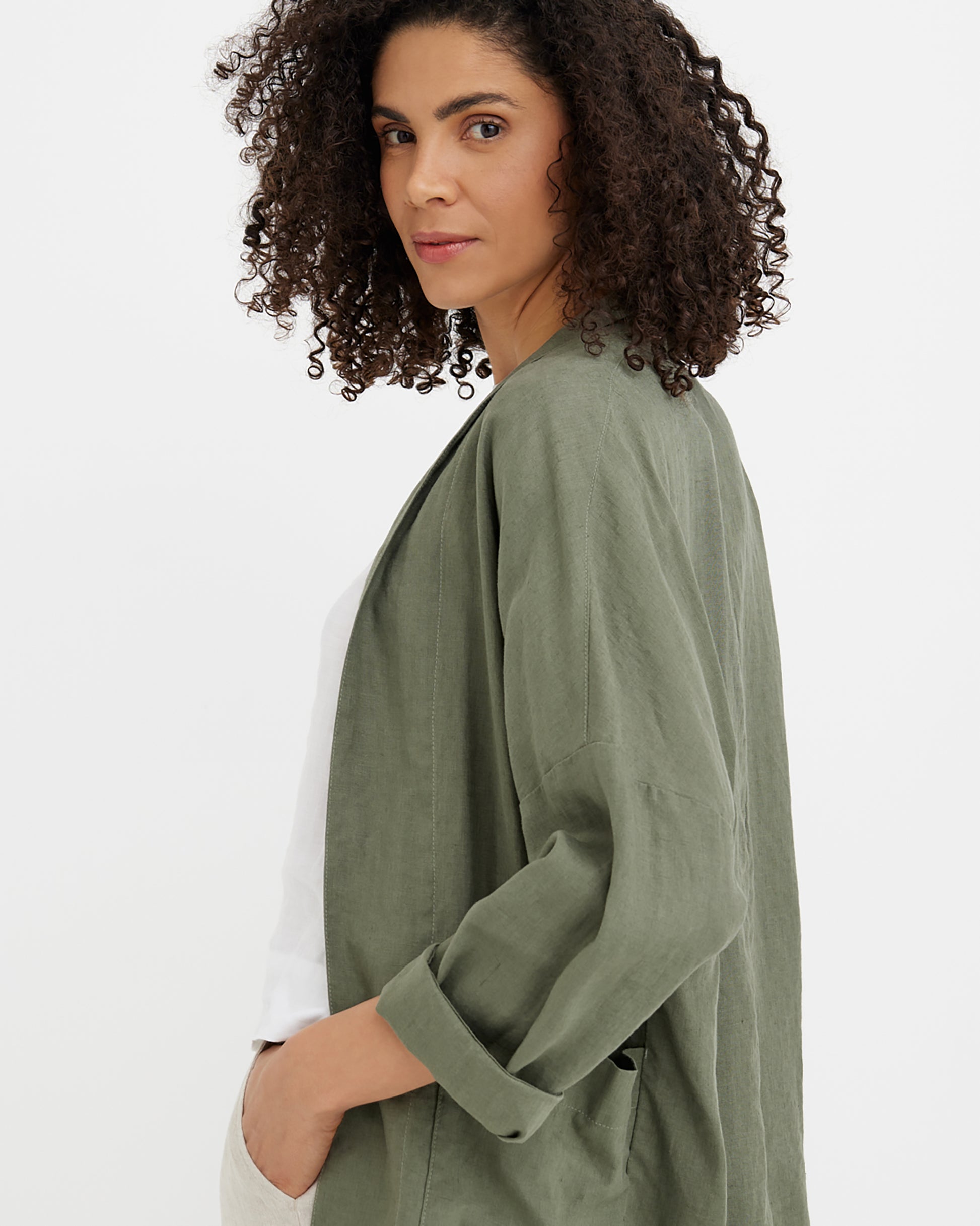 MagicLinen Mist Green linen jacket styled over neutral linen outfit  