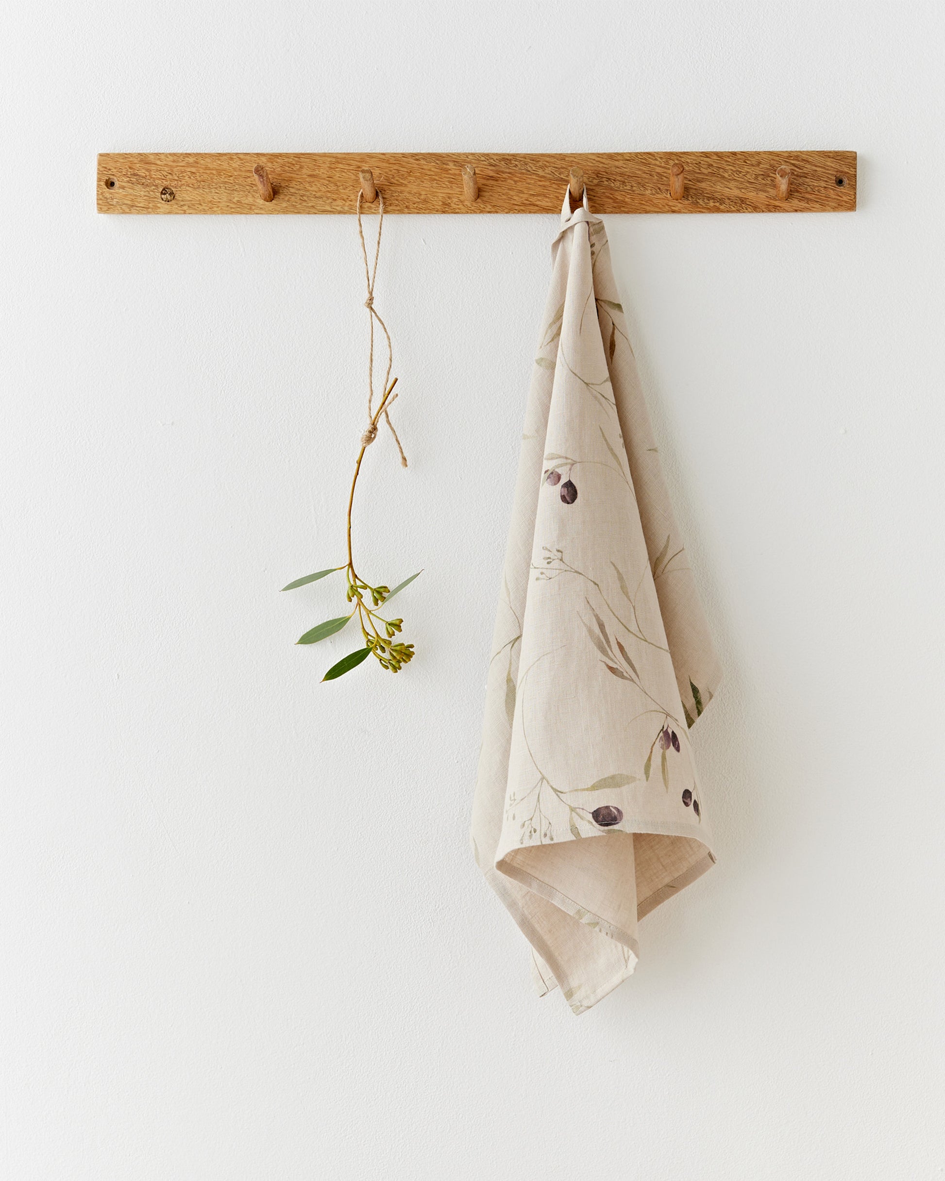 Linen tea towel in Olive orchard print on natural | MagicLinen