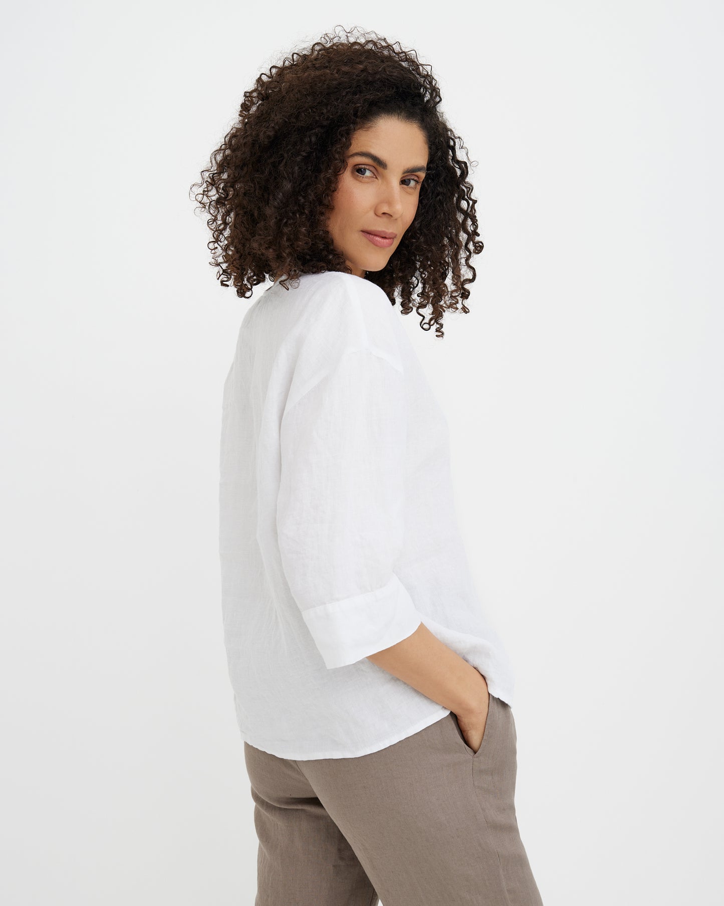 MagicLinen White linen blouse styled with linen trousers