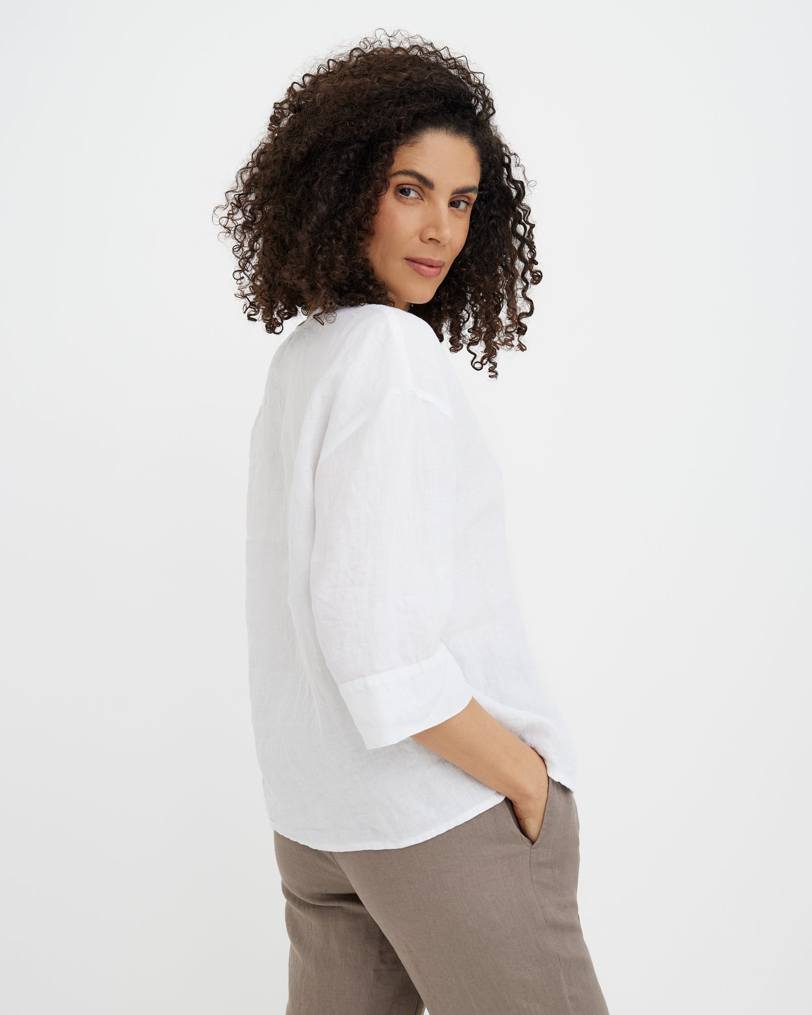 MagicLinen White linen blouse styled with linen trousers