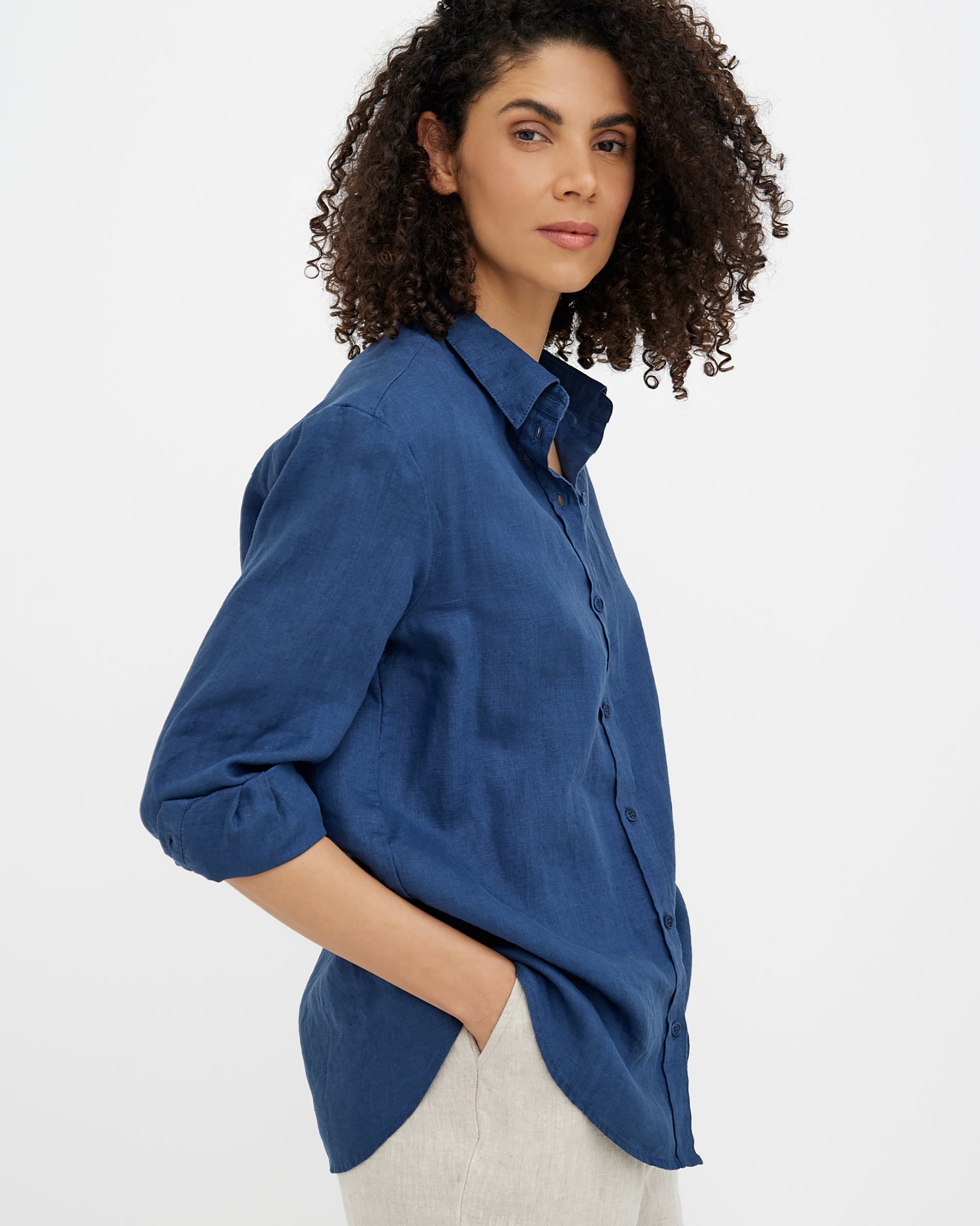 MagicLinen Deep navy blue women’s linen shirt with back pleat and corozo buttons modelBoxOn