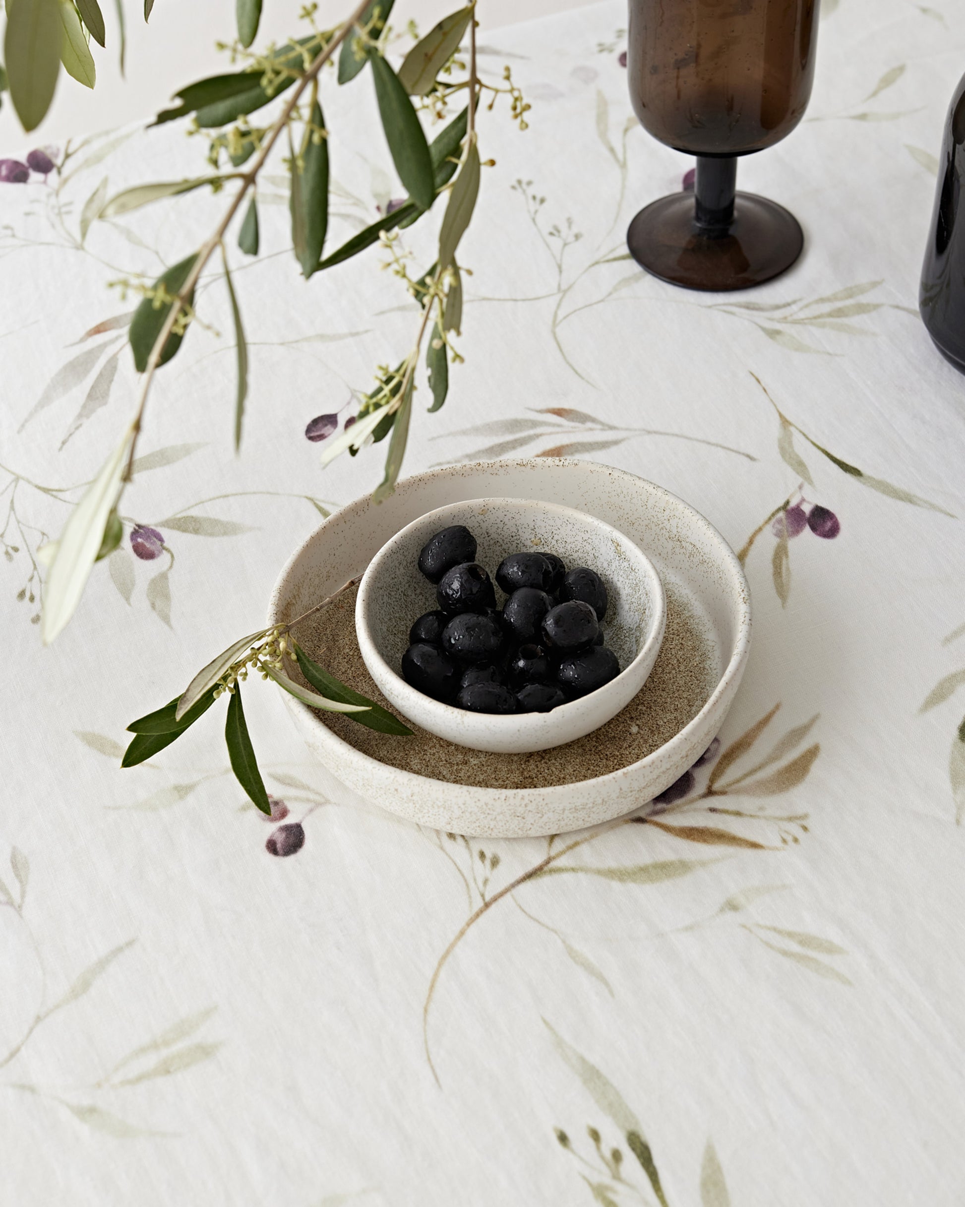 Olive orchard print on white linen tablecloth | MagicLinen
