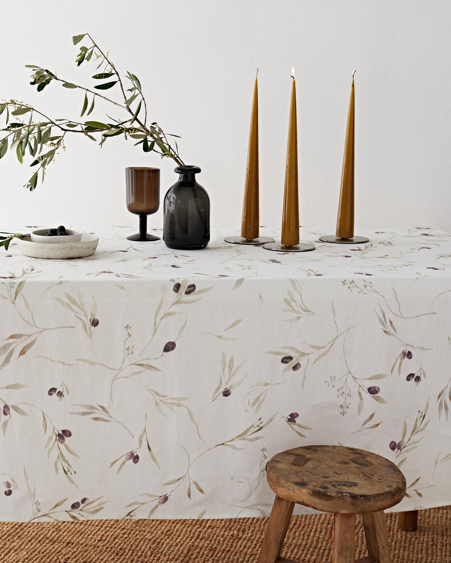 Olive orchard print on white linen tablecloth | MagicLinen