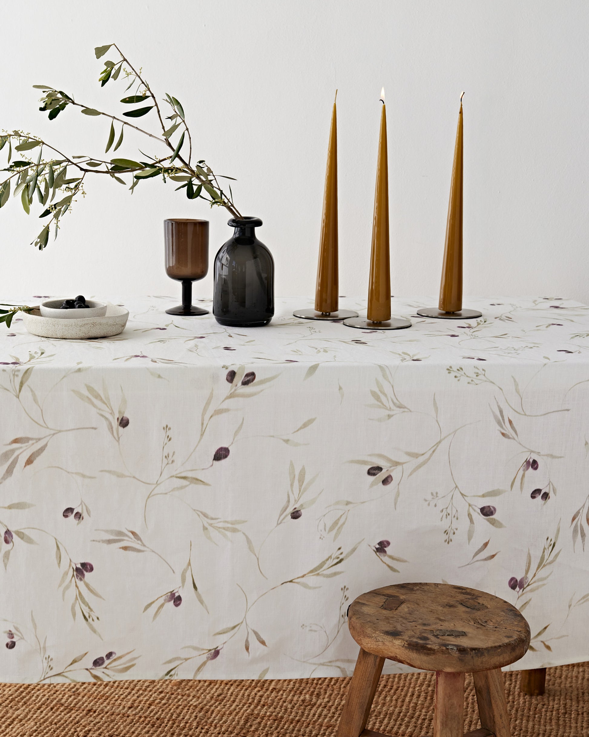 Olive orchard print on white linen tablecloth | MagicLinen