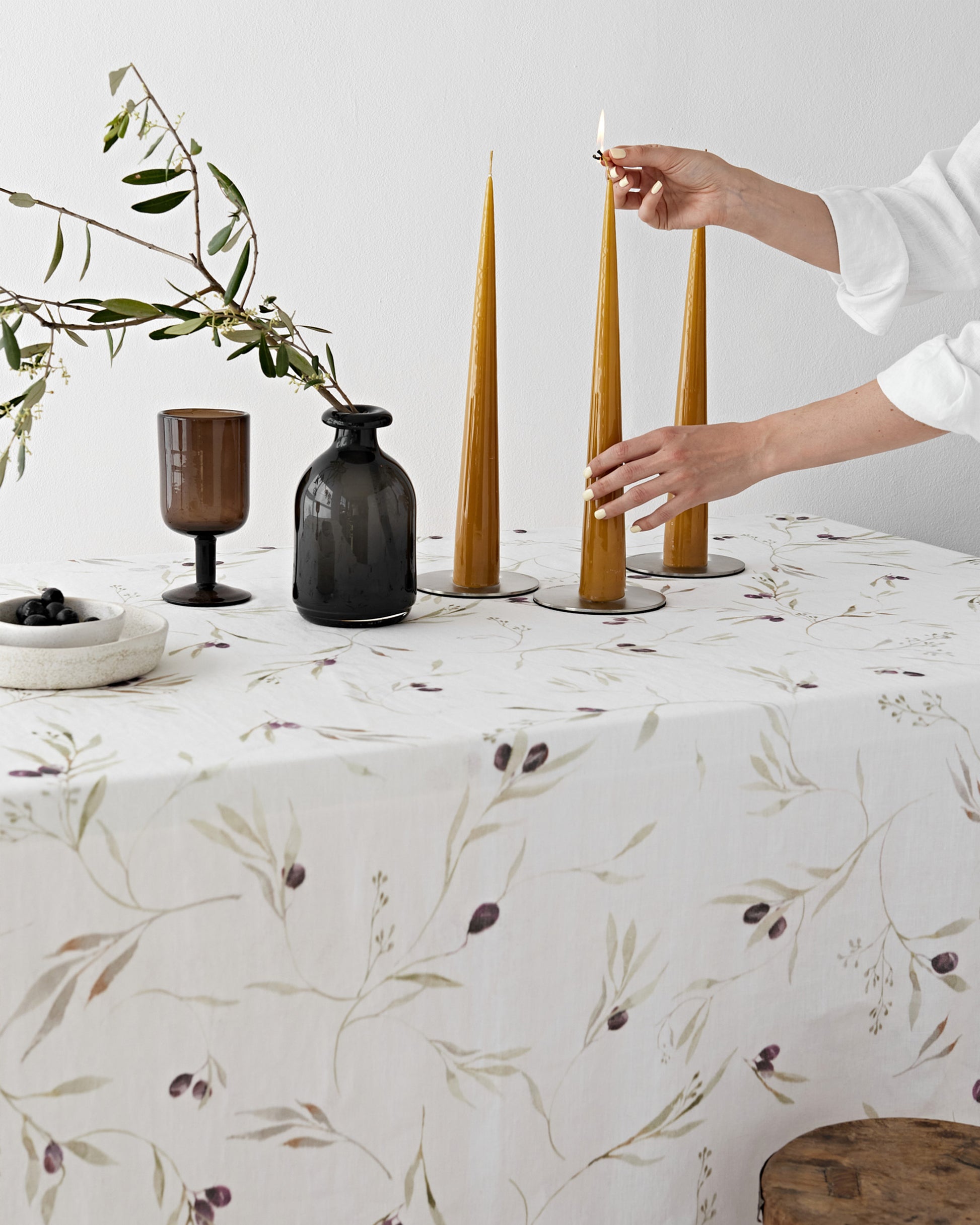Olive orchard print on white linen tablecloth | MagicLinen