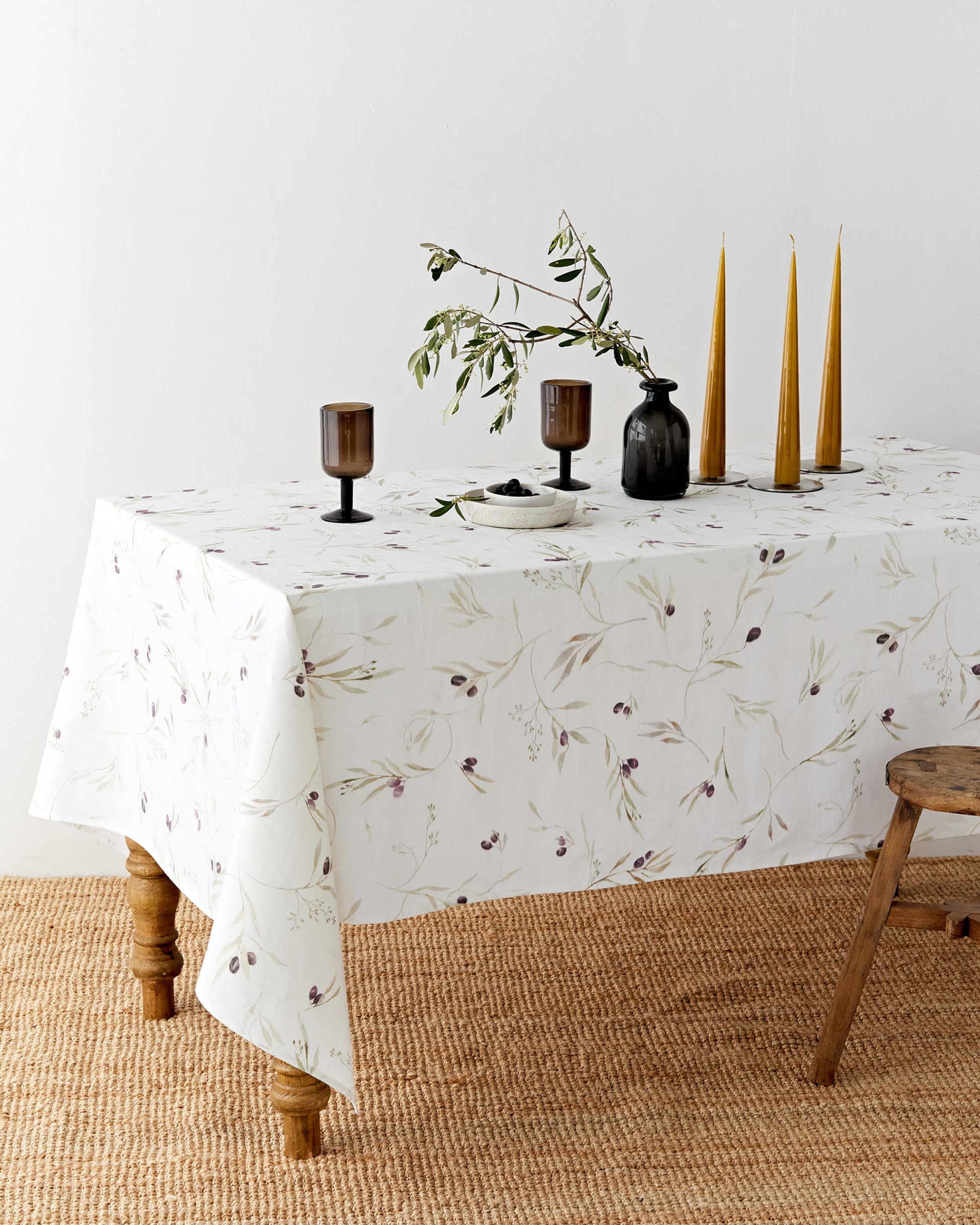 Olive orchard print on white linen tablecloth | MagicLinen