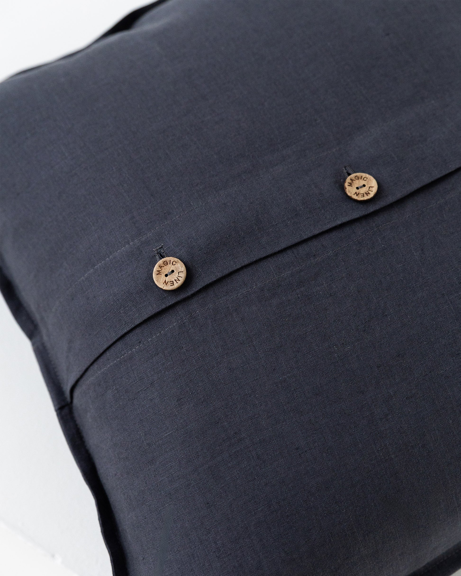 Deco Pillow Cover With Buttons in charcoal gray | MagicLinen