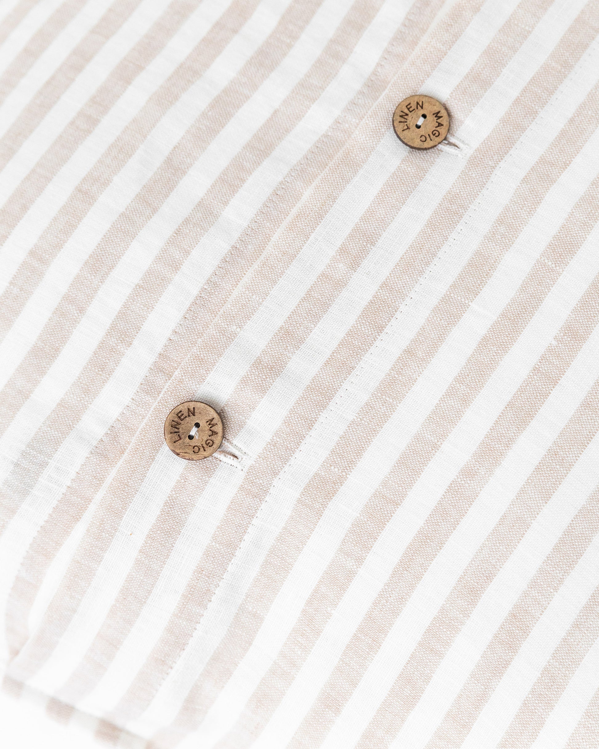 Deco Pillow Cover With Buttons in Striped in natural color | MagicLinen