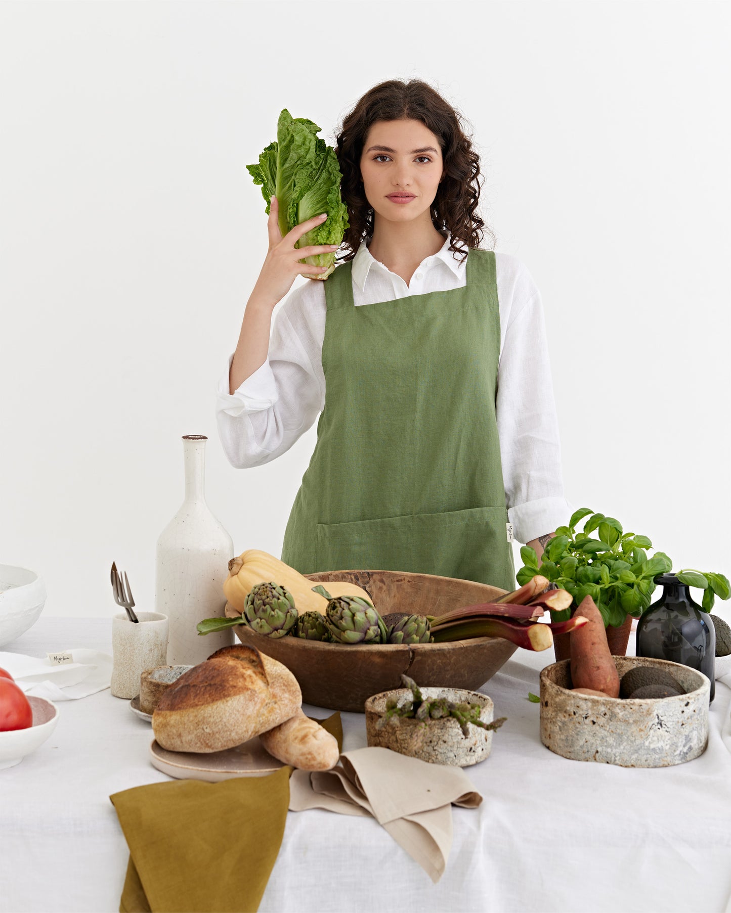Pinafore cross-back linen apron in Forest green | MagicLinen