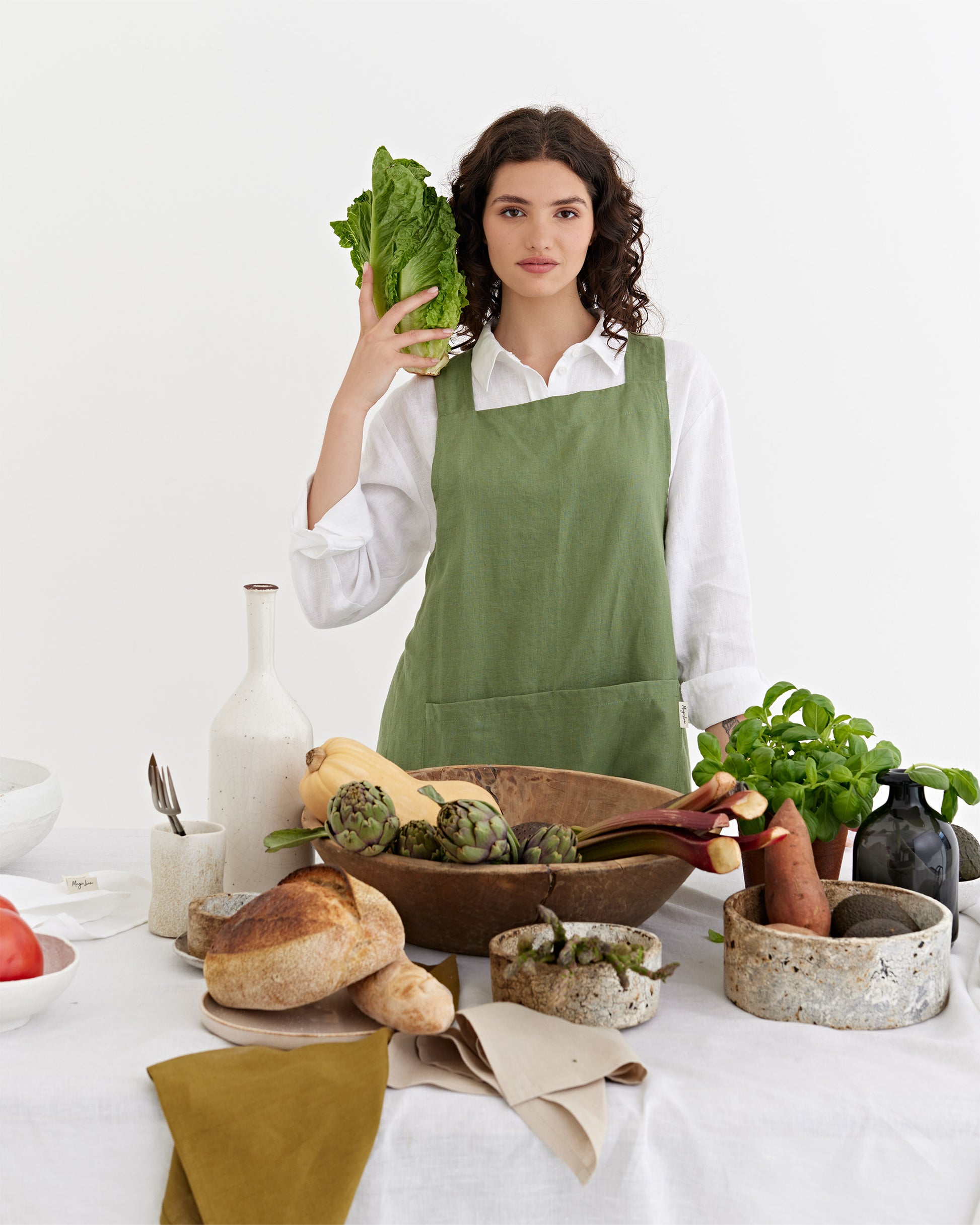 Pinafore cross-back linen apron in Forest green | MagicLinen