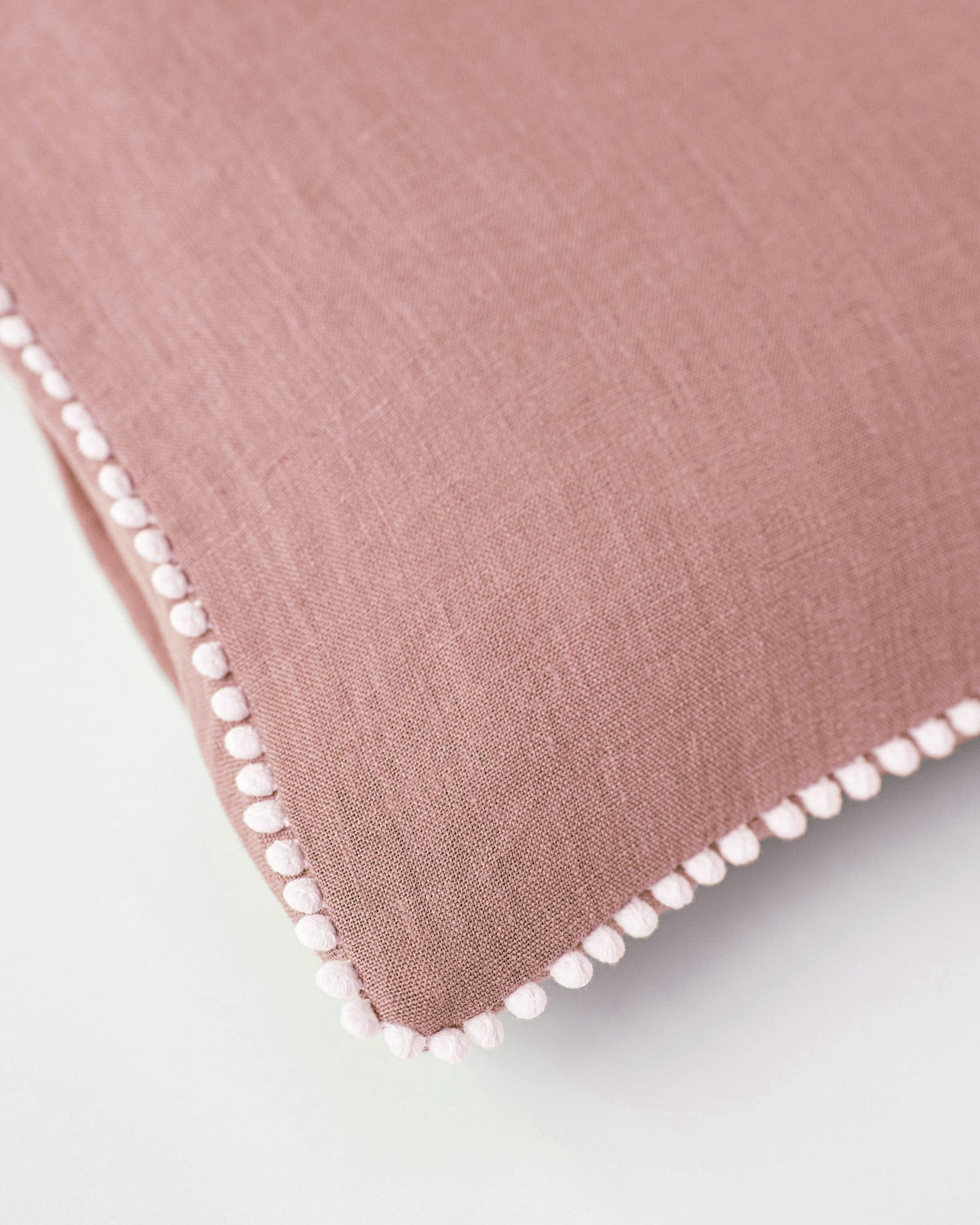 Pom Pom Trim Linen Pillowcase In Rust Pink | Magiclinen