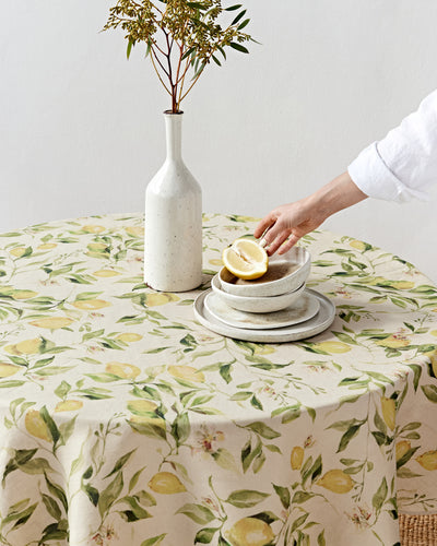 Round linen tablecloth in Citrus garden print on natural | MagicLinen
