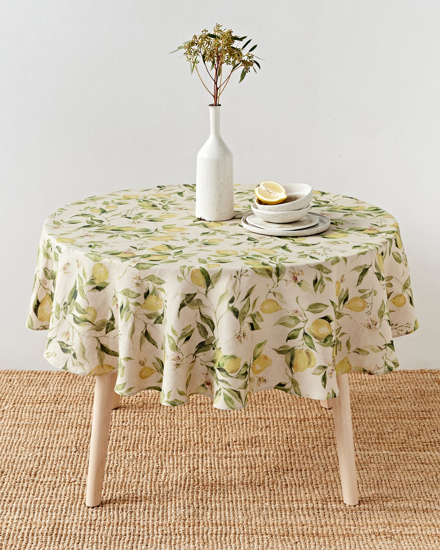 Round linen tablecloth in Citrus garden print on natural | MagicLinen