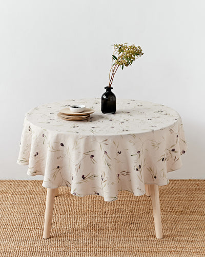 Round linen tablecloth in Olive orchard print on natural | MagicLinen