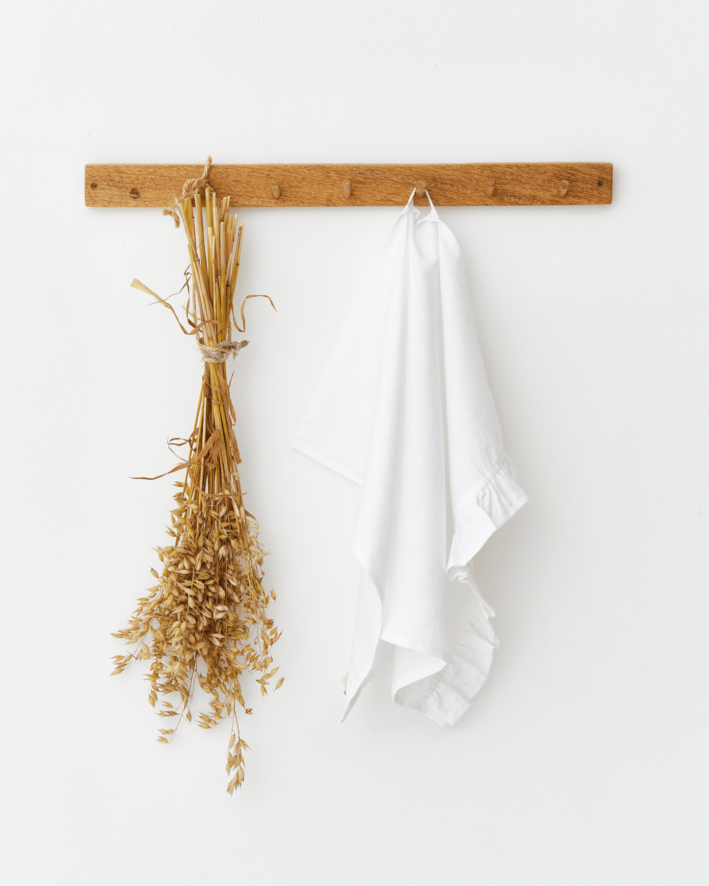 Ruffle trim linen tea towel in White