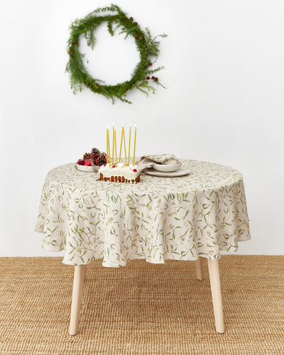 Round Linen Tablecloth in Under the mistletoe print | MagicLinen