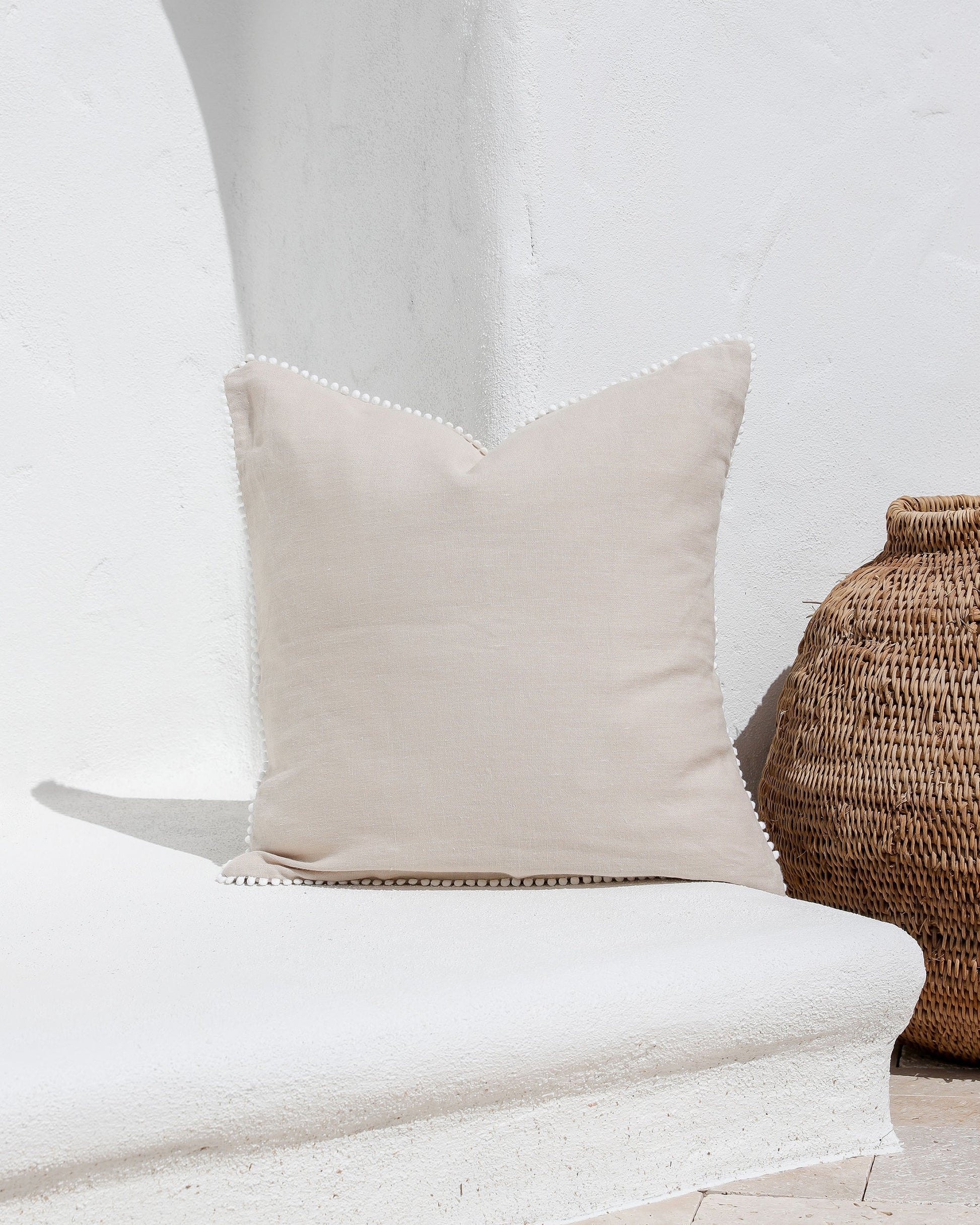 Cushion cover with pom poms in Natural linen - MagicLinen