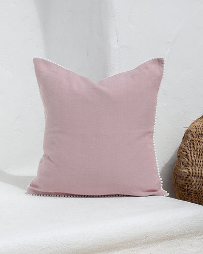 Cushion cover with pom poms in Woodrose - MagicLinen