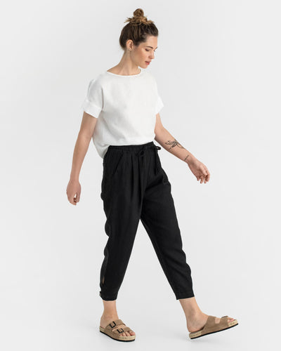 Tapered linen pants MONTAUK in Black - MagicLinen modelBoxOn
