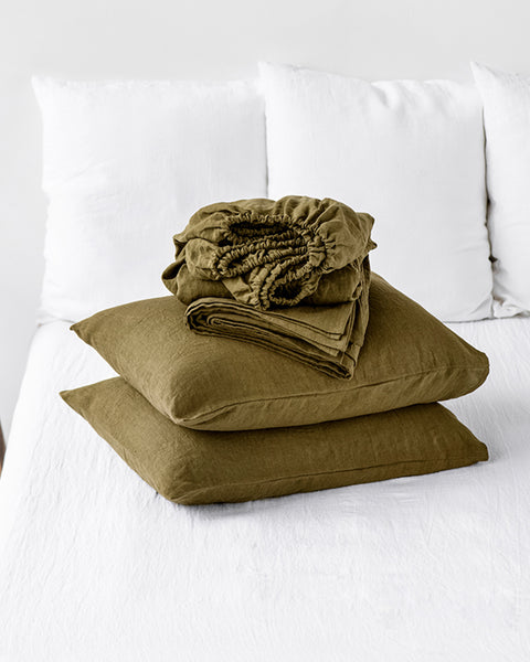 https://magiclinen.com/cdn/shop/products/olive-green-linen-sheet-set-0_grande.jpg?v=1669277641