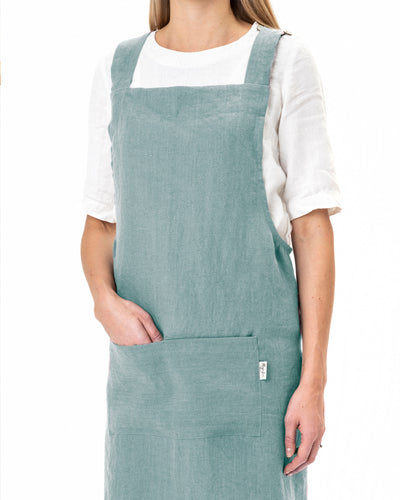 Pinafore cross-back linen apron in Aquamarine blue - MagicLinen