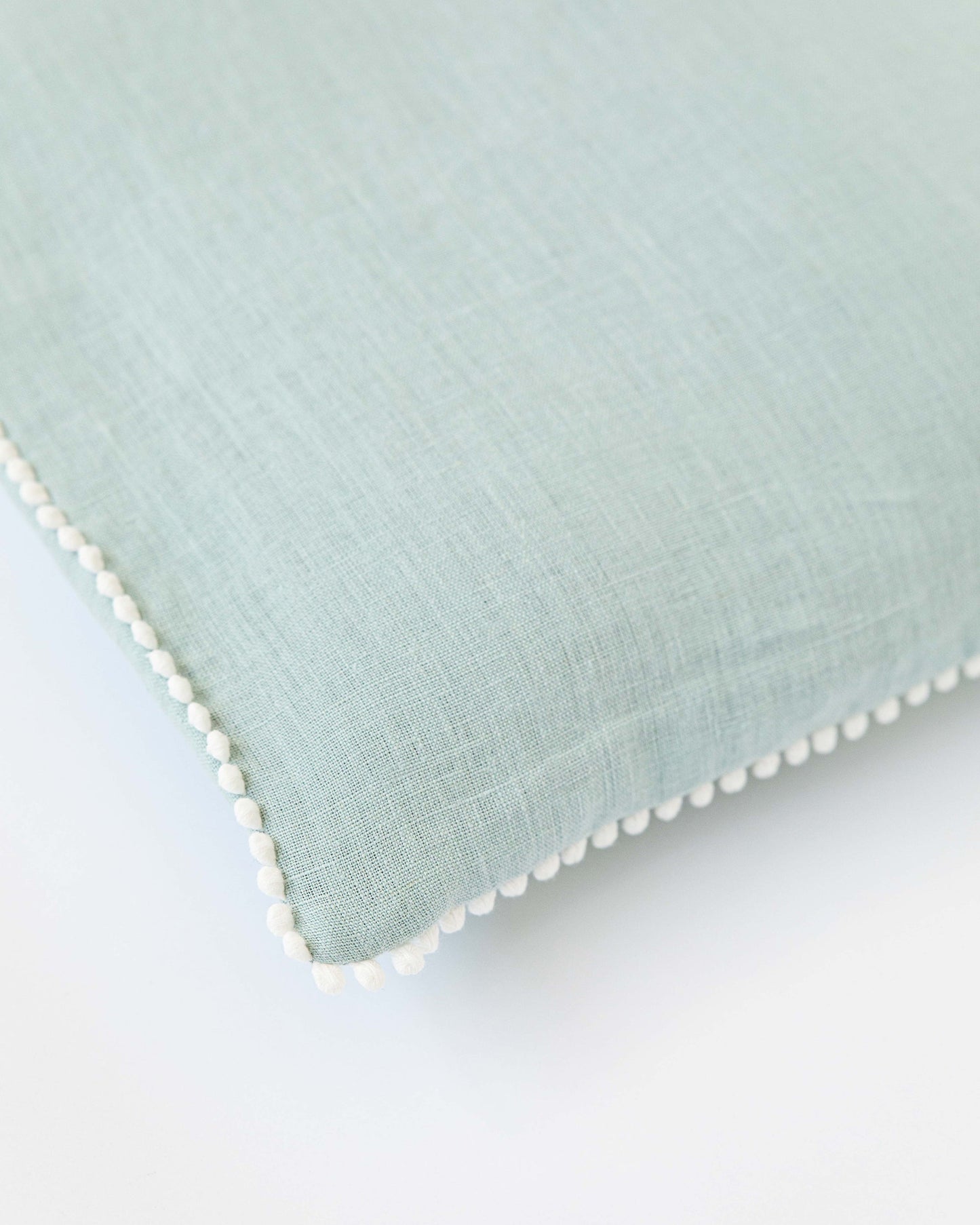 Pom pom trim linen pillowcase in Dusty Blue - MagicLinen