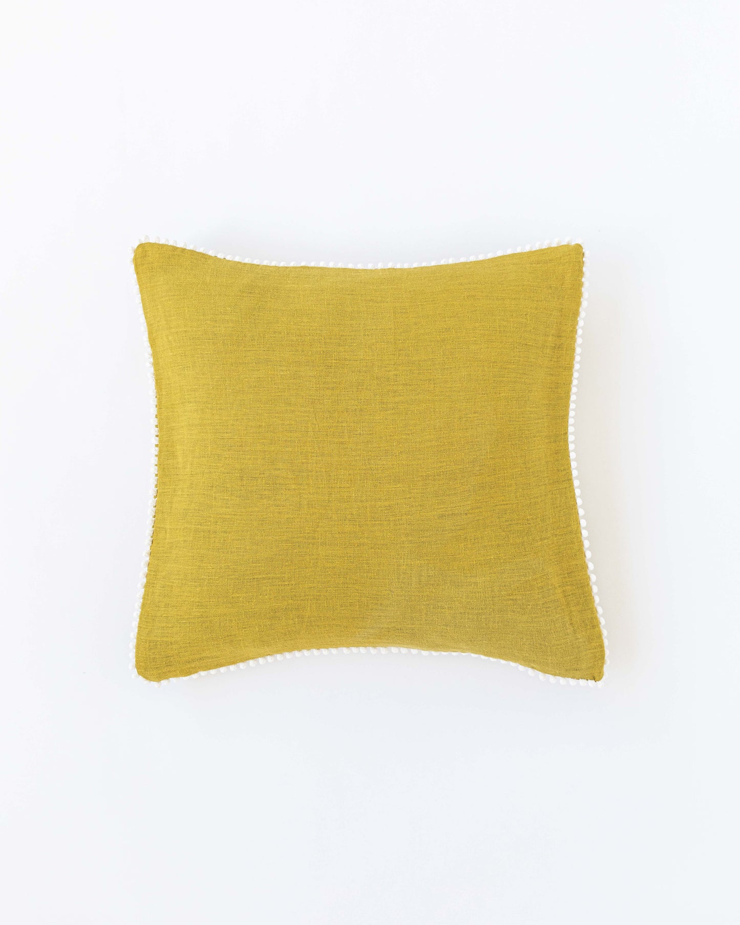 Cushion cover with pom poms in Moss yellow - MagicLinen