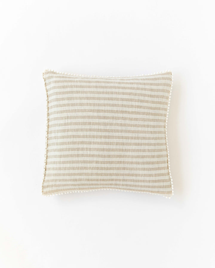 Cushion cover with pom poms in Striped in natural - MagicLinen