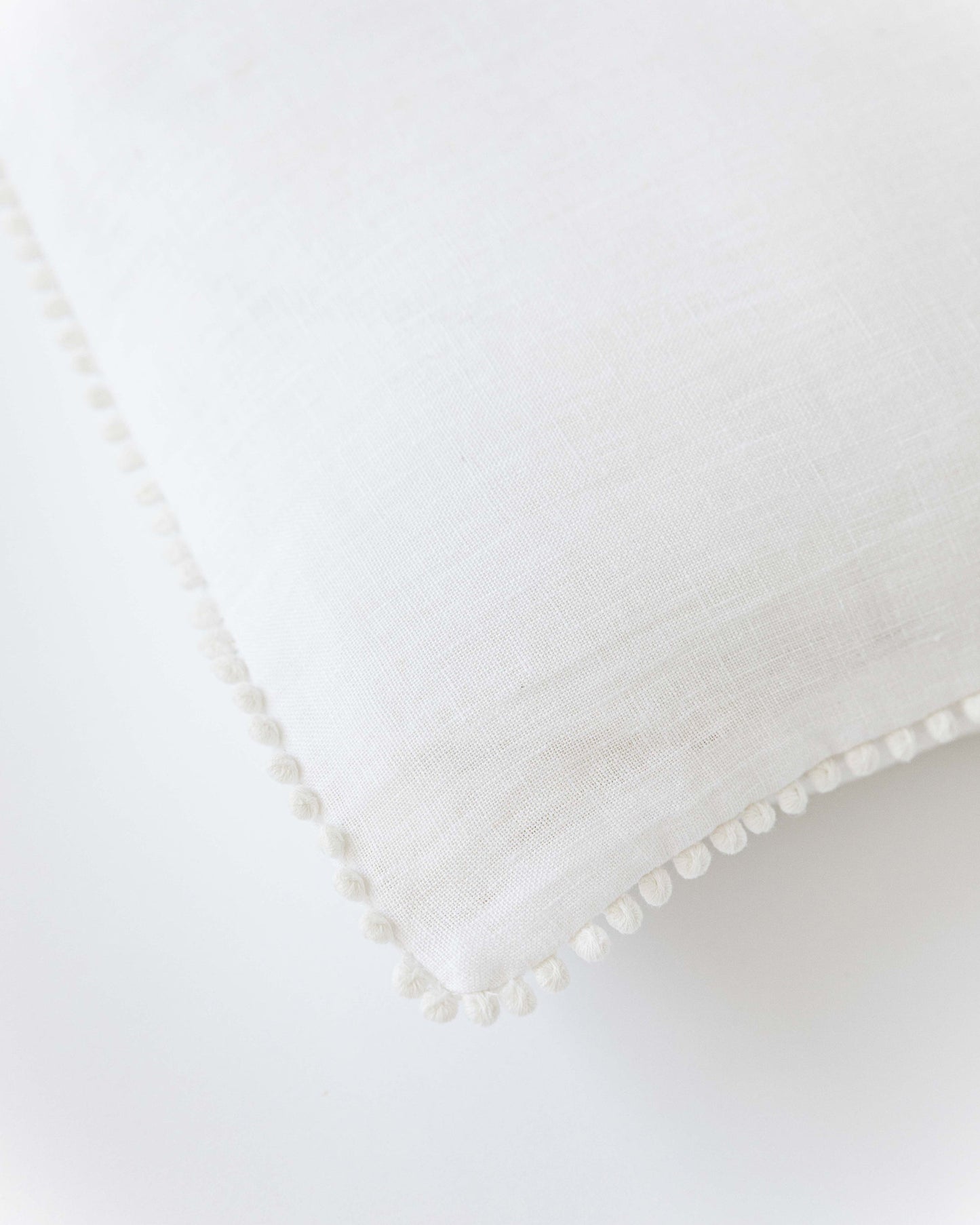 Pom pom trim linen pillowcase in White - MagicLinen