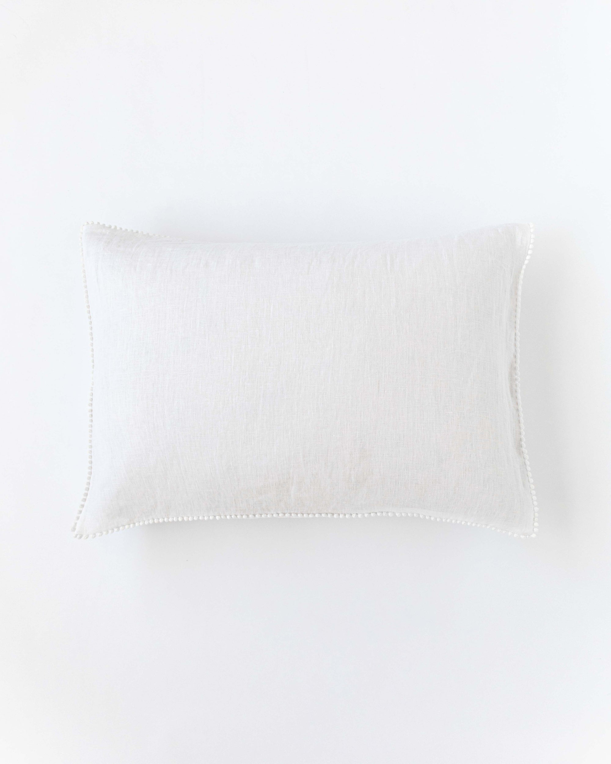 Pom pom trim linen pillowcase