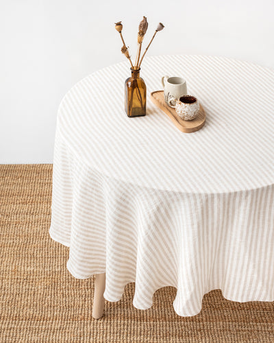 Round linen tablecloth in Striped in natural - MagicLinen