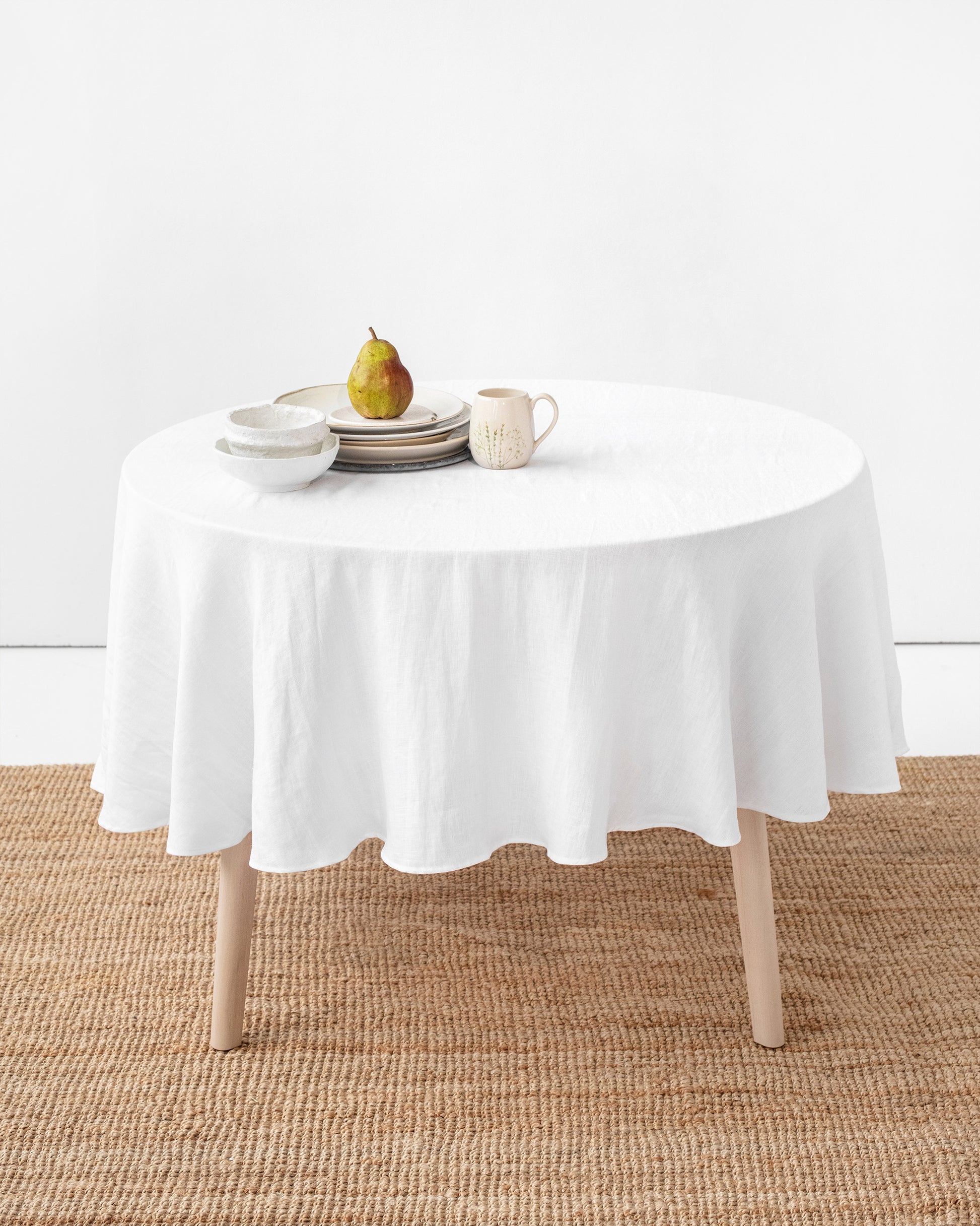 Round linen tablecloth in White - MagicLinen