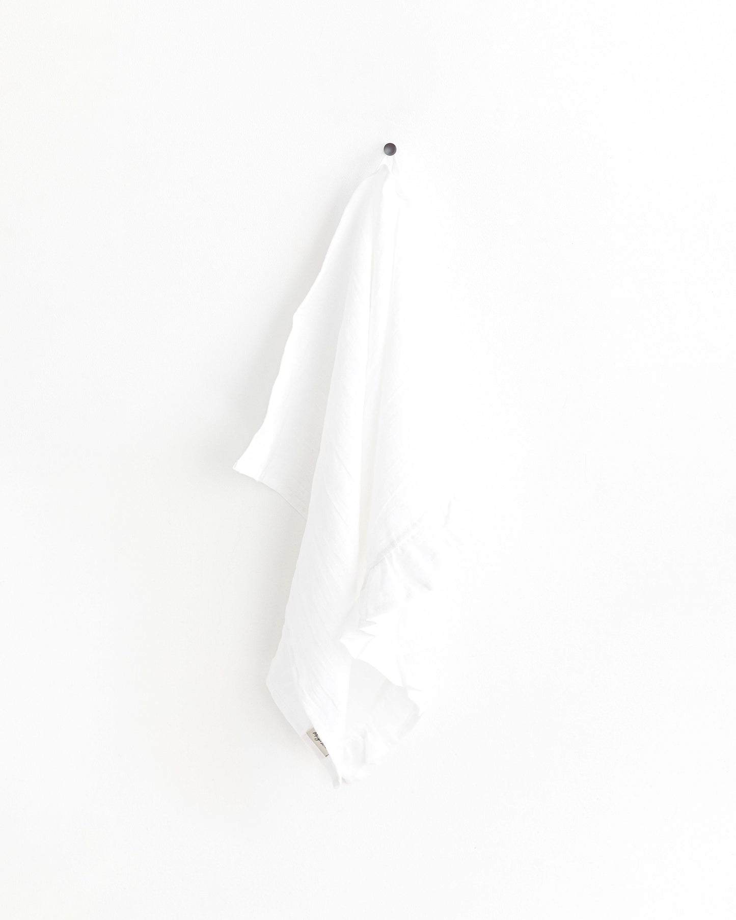 Ruffle trim linen tea towel in White - MagicLinen