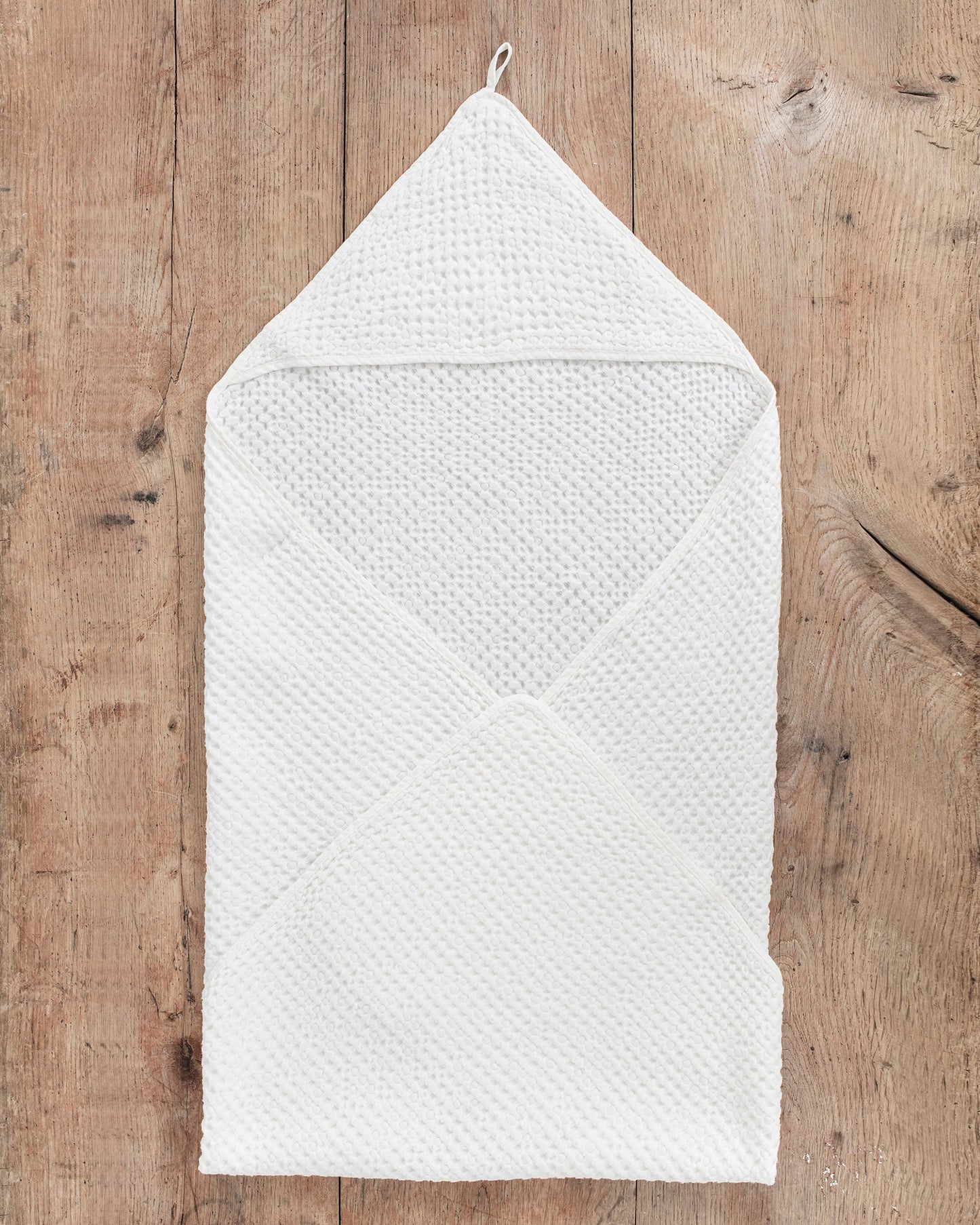 Hooded waffle baby towel in White - MagicLinen