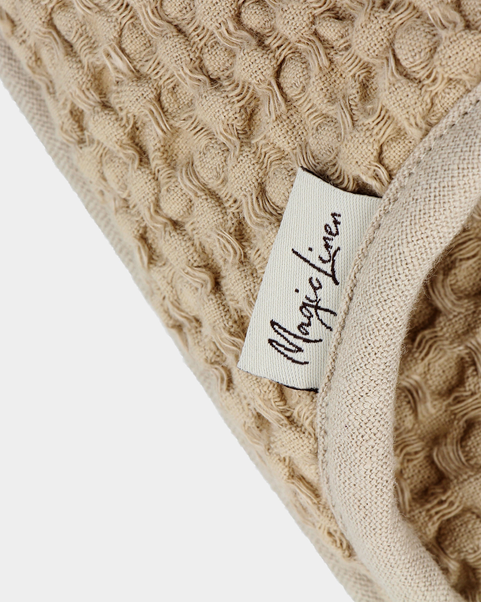 https://magiclinen.com/cdn/shop/products/waffle-linen-slippers-beige-3.jpg?v=1701854256&width=1946