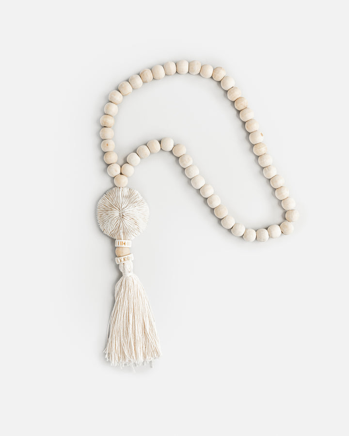 Wooden beaded tassel with white shell - MagicLinen